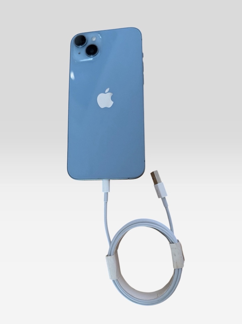 Apple iPhone 14 Plus in Light Blue with Charging Cable